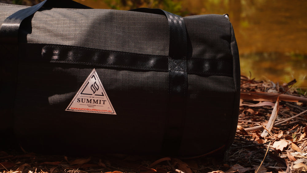 Stirling canvas gear bag, available in blue, green, white, black, purple, and grey