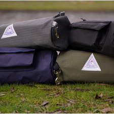 Heavy-duty ripstop canvas saddle bag with zippered main compartment and external flap pocket