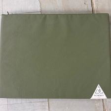 small sized green canvas dog bed 